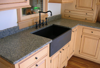 Qualey Granite designs and installs granite, quartz, marble and natural stone countertops, vanities, tub surrounds, hearths, walk ways and walls with one of the largest natural stone inventories Maine.